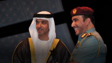 اللواء ناصر أمد الريسي (يمين)